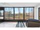 Spacious screened porch with ample seating and tranquil nature views at 6800 Placida Rd # 165, Englewood, FL 34224