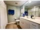 Bathroom with a shower and tub, double vanity, and plenty of counter space at 8050 Memory Ln # 104, Rotonda West, FL 33947