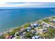 Aerial view of waterfront home and surrounding neighborhood at 860 Knights Ln, Englewood, FL 34223