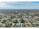Aerial view of a residential area showing many houses at 9261 Saint Catherine Ave, Englewood, FL 34224