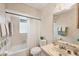 Bathroom with tub, toilet and vanity at 9261 Saint Catherine Ave, Englewood, FL 34224
