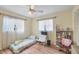 Small bedroom with twin bed and bookcase at 9261 Saint Catherine Ave, Englewood, FL 34224