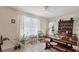 Charming dining room featuring a rustic wooden table and hutch at 9261 Saint Catherine Ave, Englewood, FL 34224