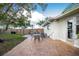 Charming brick patio perfect for outdoor dining at 97 Lakeview Ln, Englewood, FL 34223