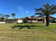 Spacious home with large yard and detached garage at 9822 Gulfstream Blvd, Englewood, FL 34224