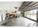 Attached garage with shelving and workbench at 9822 Gulfstream Blvd, Englewood, FL 34224