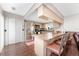 Modern kitchen featuring stainless steel appliances and a breakfast bar at 9822 Gulfstream Blvd, Englewood, FL 34224