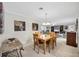 Charming dining room with wood table and chairs at 1035 Oleander St, Englewood, FL 34223