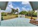 Large backyard with patio and fenced area at 11091 Corrigan Ave, Englewood, FL 34224