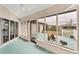 Spacious screened porch with access to backyard patio at 11091 Corrigan Ave, Englewood, FL 34224
