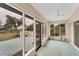 Relaxing screened porch overlooking backyard at 11091 Corrigan Ave, Englewood, FL 34224