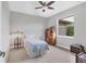 Small bedroom with window and vintage furniture at 116 Hercules Dr, Rotonda West, FL 33947