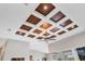 Coffered ceiling with wood detailing and recessed lighting at 116 Hercules Dr, Rotonda West, FL 33947