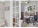 Home office with built-in shelving and large window at 116 Hercules Dr, Rotonda West, FL 33947