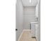 Laundry room with washer, dryer, and cabinets at 116 Hercules Dr, Rotonda West, FL 33947