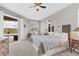 Main bedroom with sliding doors to the pool area at 116 Hercules Dr, Rotonda West, FL 33947