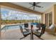 Screened pool area with patio furniture at 116 Hercules Dr, Rotonda West, FL 33947