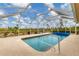 Relaxing screened pool with ample deck space at 116 Hercules Dr, Rotonda West, FL 33947