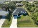 Housetop view showing house, driveway, and surrounding landscape at 12063 Claremont Dr, Port Charlotte, FL 33981
