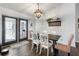 Bright dining room with French doors opening to the patio at 12063 Claremont Dr, Port Charlotte, FL 33981