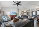 Spacious living area featuring a sectional sofa and hardwood floors at 12063 Claremont Dr, Port Charlotte, FL 33981