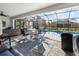 Spacious pool area with patio furniture and screened enclosure at 12063 Claremont Dr, Port Charlotte, FL 33981