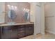 Double vanity bathroom with glass sinks and mosaic tile at 13048 Creekside Ln, Port Charlotte, FL 33953