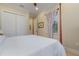 Guest bedroom with wood post bed and ample closet space at 13048 Creekside Ln, Port Charlotte, FL 33953