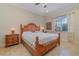 Main bedroom with wood furnishings and neutral color scheme at 13048 Creekside Ln, Port Charlotte, FL 33953