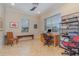 Bright home office features built-in shelving and hardwood floors at 13048 Creekside Ln, Port Charlotte, FL 33953
