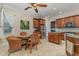 Eat in kitchen with wooden cabinets, granite countertops, and stainless steel appliances at 13048 Creekside Ln, Port Charlotte, FL 33953