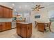 Kitchen island with granite countertop and breakfast nook at 13048 Creekside Ln, Port Charlotte, FL 33953