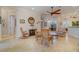 Spacious living room with tile floors, ceiling fan, and comfortable seating at 13048 Creekside Ln, Port Charlotte, FL 33953
