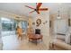 Living area with a view of the entryway and patio doors leading outside at 13048 Creekside Ln, Port Charlotte, FL 33953