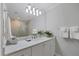 Bright bathroom with updated vanity and walk-in shower at 13213 Gasparilla Rd # B601, Placida, FL 33946
