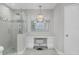 Spa-like bathroom with a large shower and vanity at 13213 Gasparilla Rd # B601, Placida, FL 33946