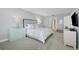 Serene bedroom with light blue accents and a ceiling fan at 13213 Gasparilla Rd # B601, Placida, FL 33946
