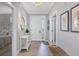Bright and airy entryway with light walls and decorative accents at 13213 Gasparilla Rd # B601, Placida, FL 33946