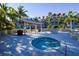 Community hot tub with surrounding patio furniture at 13213 Gasparilla Rd # B601, Placida, FL 33946