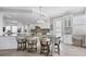 Modern kitchen with a large island and white cabinetry at 13213 Gasparilla Rd # B601, Placida, FL 33946