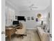 Home office with built-in desk and comfortable seating at 13213 Gasparilla Rd # B601, Placida, FL 33946