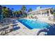 Inviting resort-style pool with lounge chairs and patio at 13213 Gasparilla Rd # B601, Placida, FL 33946