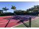 Two well-maintained tennis courts with nets at 13213 Gasparilla Rd # B601, Placida, FL 33946