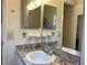 Bathroom with a vanity and large mirror at 13537 Bennett Dr, Port Charlotte, FL 33981