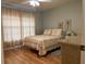 Bright bedroom with wood floors and ample closet space at 13537 Bennett Dr, Port Charlotte, FL 33981