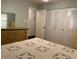 Spacious bedroom with large closets and view of hallway at 13537 Bennett Dr, Port Charlotte, FL 33981