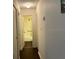 Hallway with bathroom and closets visible at 13537 Bennett Dr, Port Charlotte, FL 33981