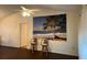 Living room with beach mural and two bar stools at 13537 Bennett Dr, Port Charlotte, FL 33981