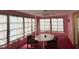 Sunroom with table and chairs, offering extra living space at 13537 Bennett Dr, Port Charlotte, FL 33981