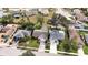 Aerial view of a single Gathering home with a large backyard and driveway at 1441 Strada D Oro, Venice, FL 34292